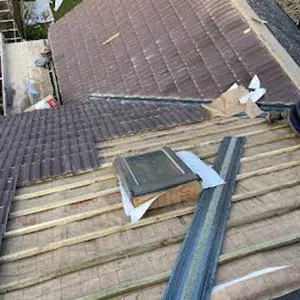 the roof of a house that has been gutted